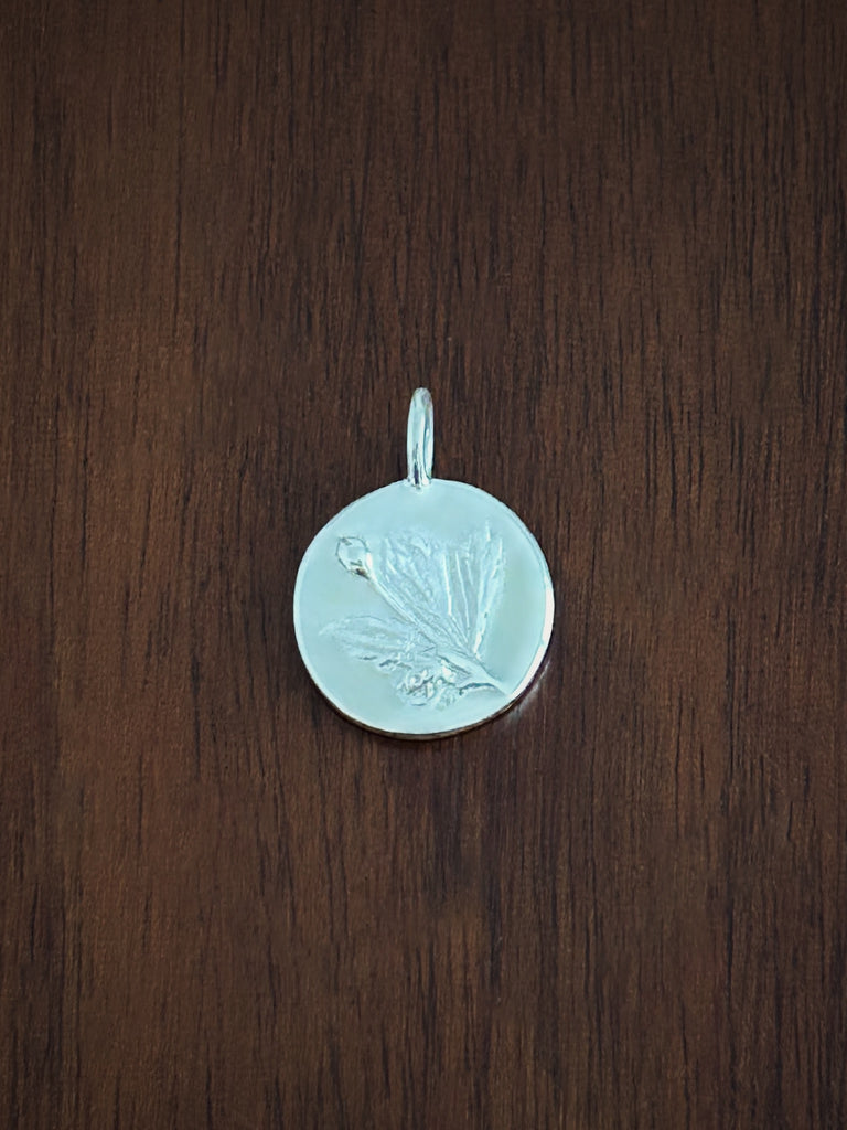 cinquefoil coin charm sterling silver