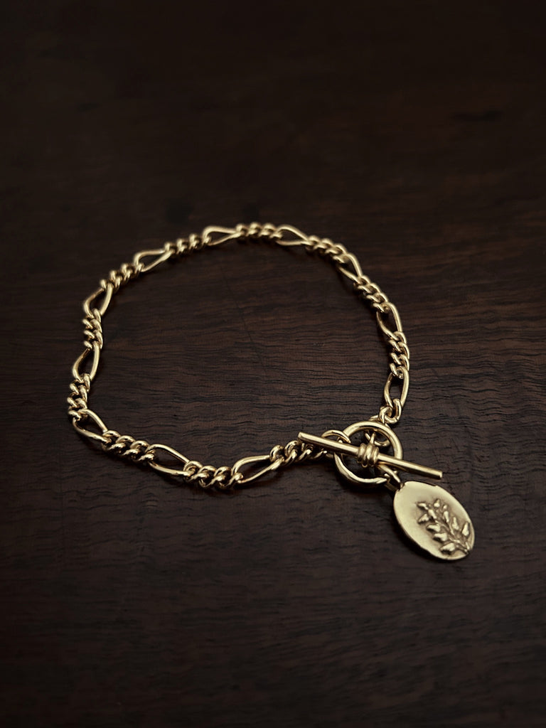 Gold Heather Charm Figaro T Bar Bracelet