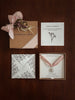 Sterling Silver pendant with Flower & Fable packaging in Welsh on a wooden surface
