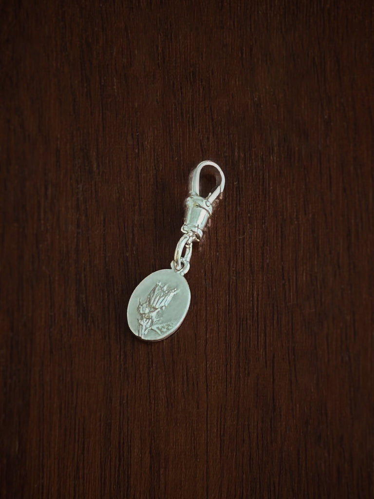 Herb Robert medal charm for good luck with an albert swivel clasp