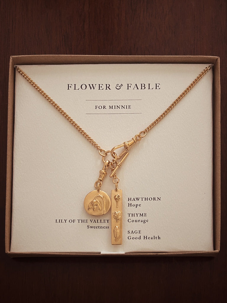 Gold Lily Of The Valley Charm & Strength Bar watch chain necklace