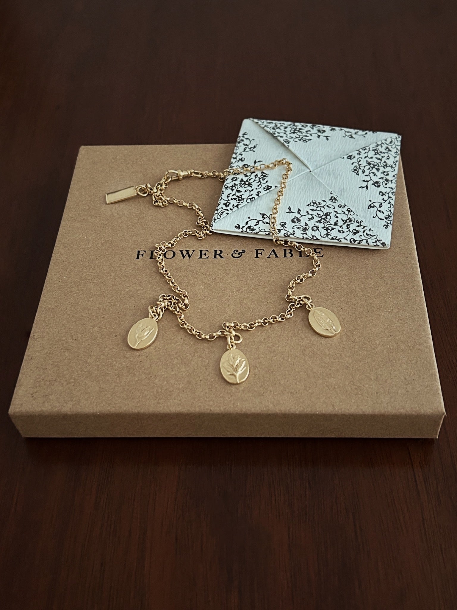 Gold Triple Charm Necklace with Flower & Fable love note