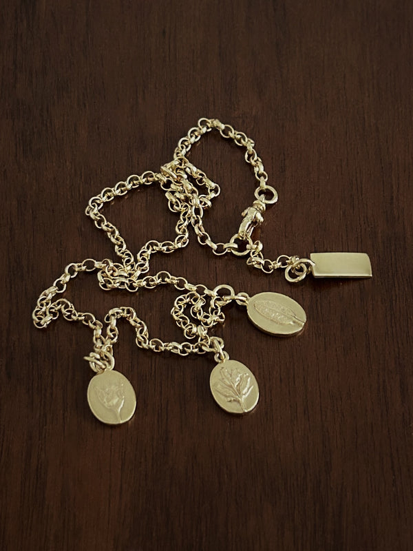 Sterling silver flower charm necklce