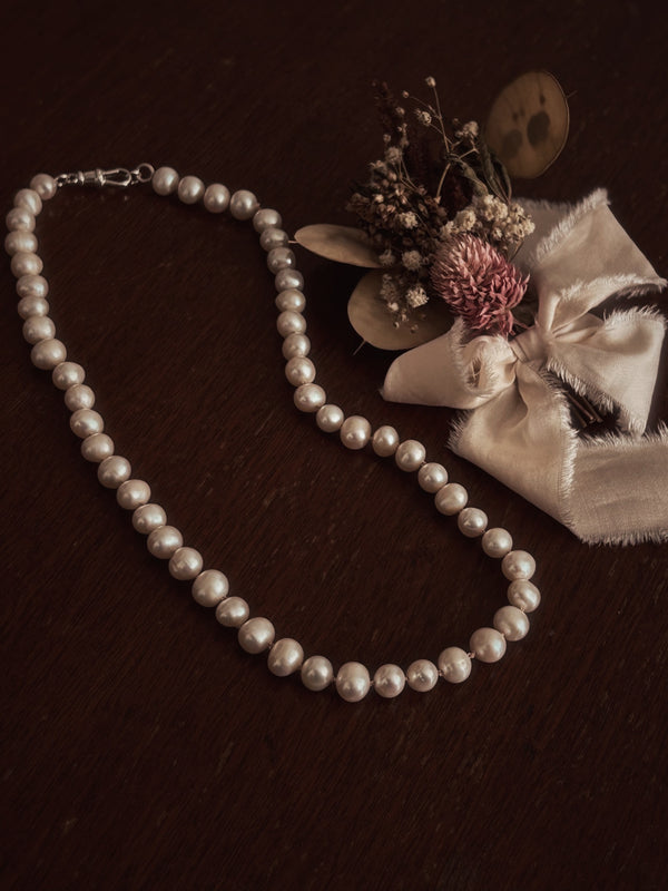 Hand strung and knotted Silver Pearl bead necklace