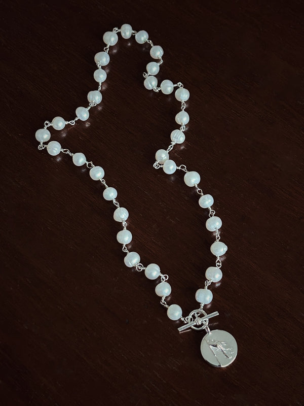 Hand wired sterling silver t bar pearl necklace and Volet flower charm