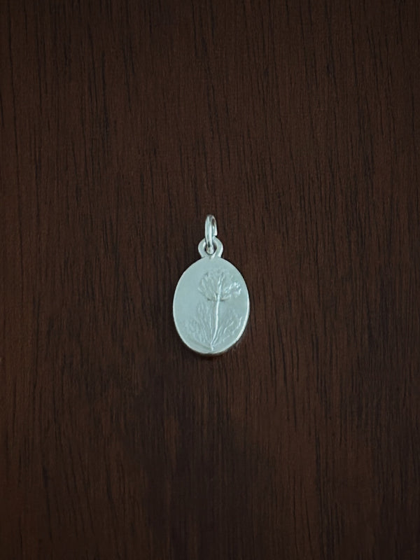 Silver shamrock medal charm