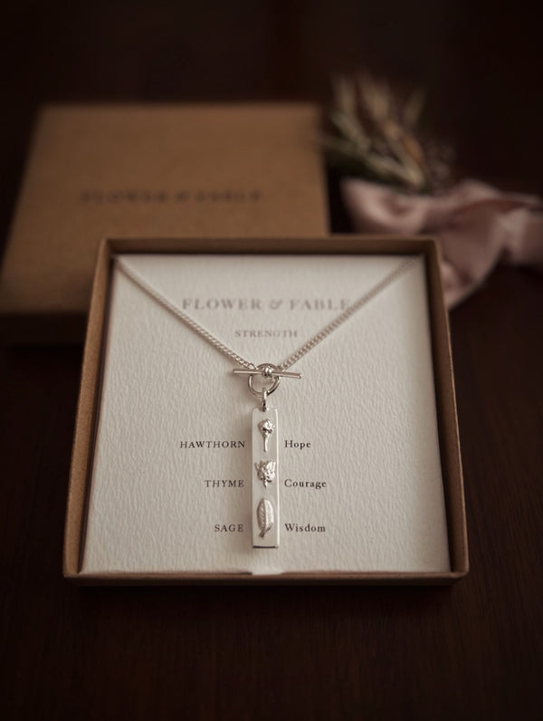 Silver necklace with pendant in a 'Flower & Fable' box